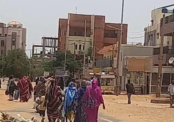 Women flee Abu Rouf neighbourhood of Omudrman on Tuesday August 8, 2023