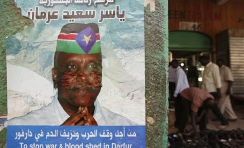 a presidential electoral poster for Yasser Arman, the opposition candidate of the SPLM, at the Arabic market in the old town of Khartoum, , April 4, 2010. ap